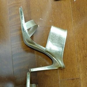 Gold high heel sandals
